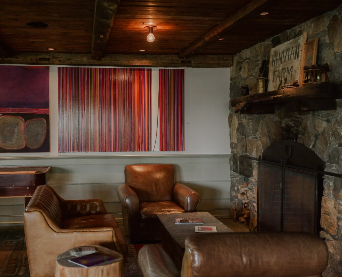 Seating area in leather couches near the firepit